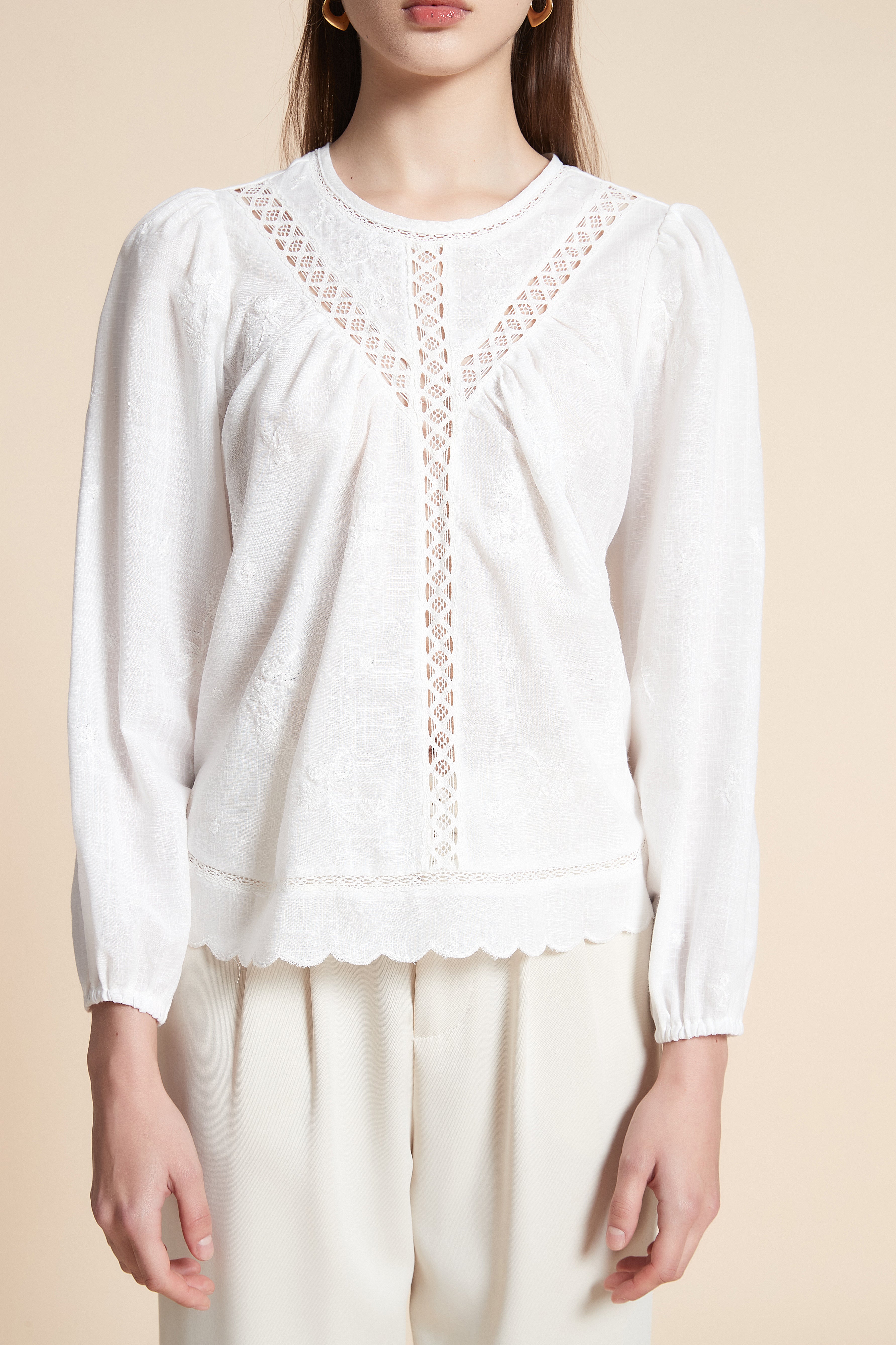 بلوزة متوسطة الطول سادة كم طويل