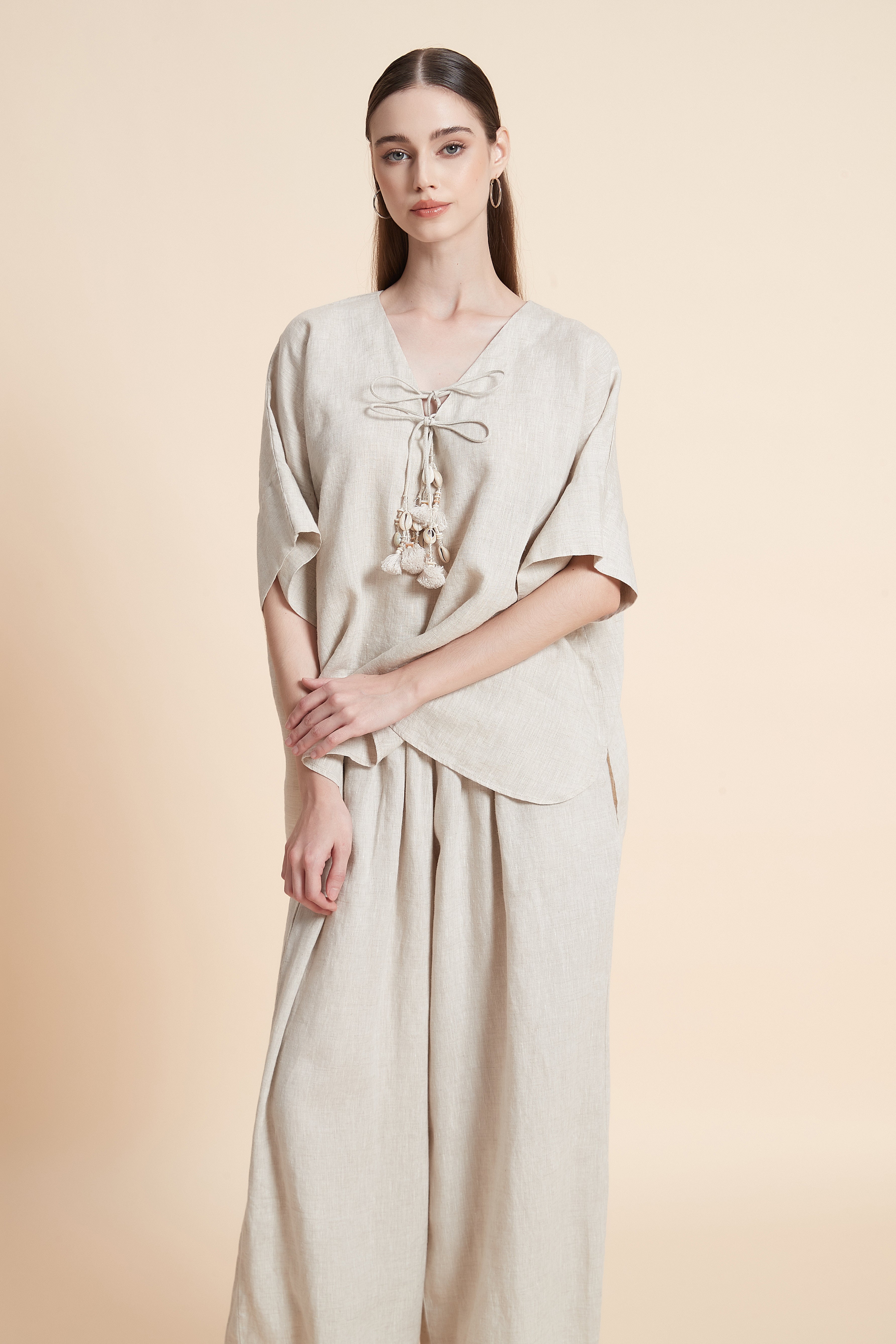 Linen blouse with tassel details