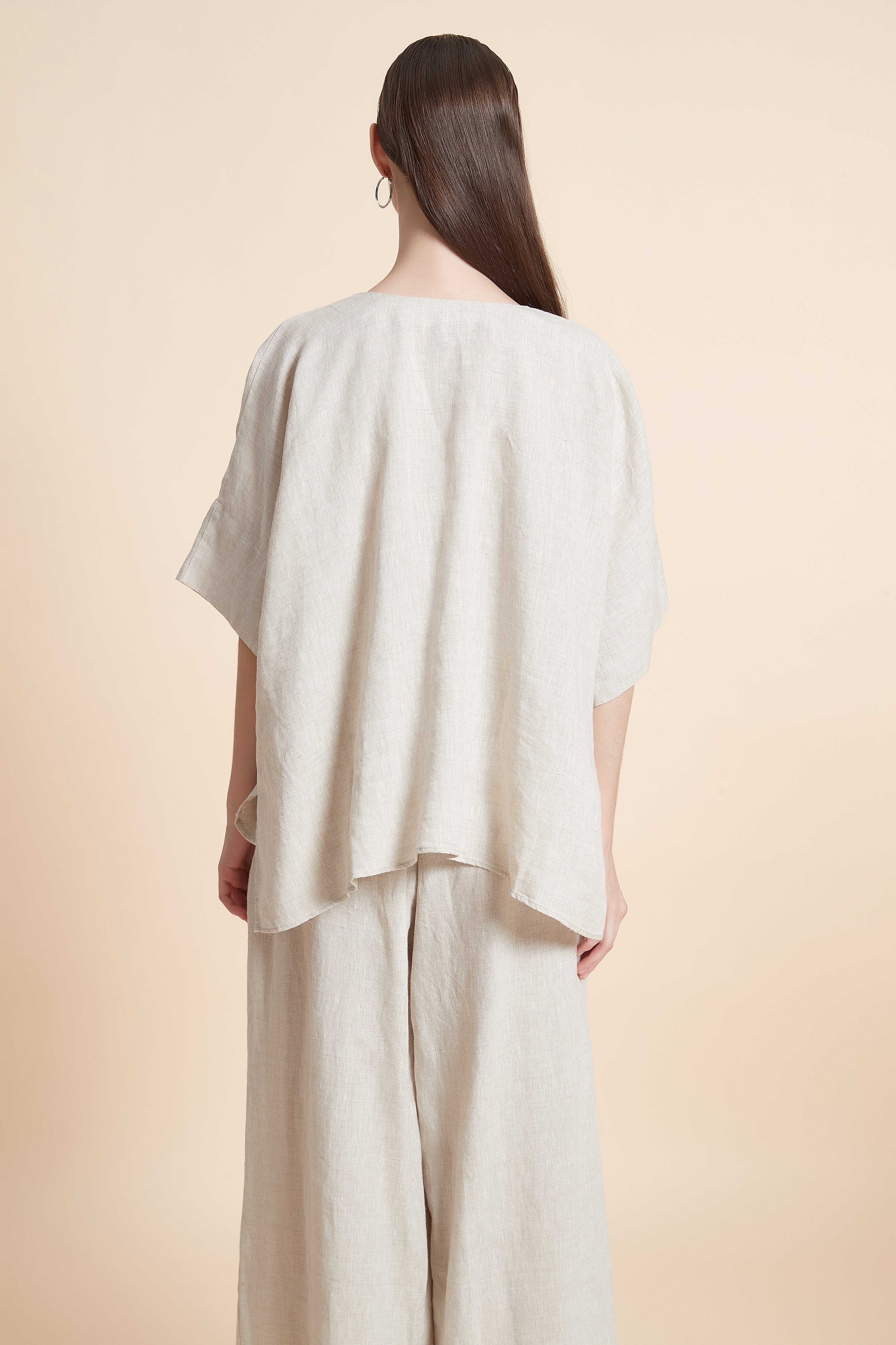 Linen blouse with tassel details