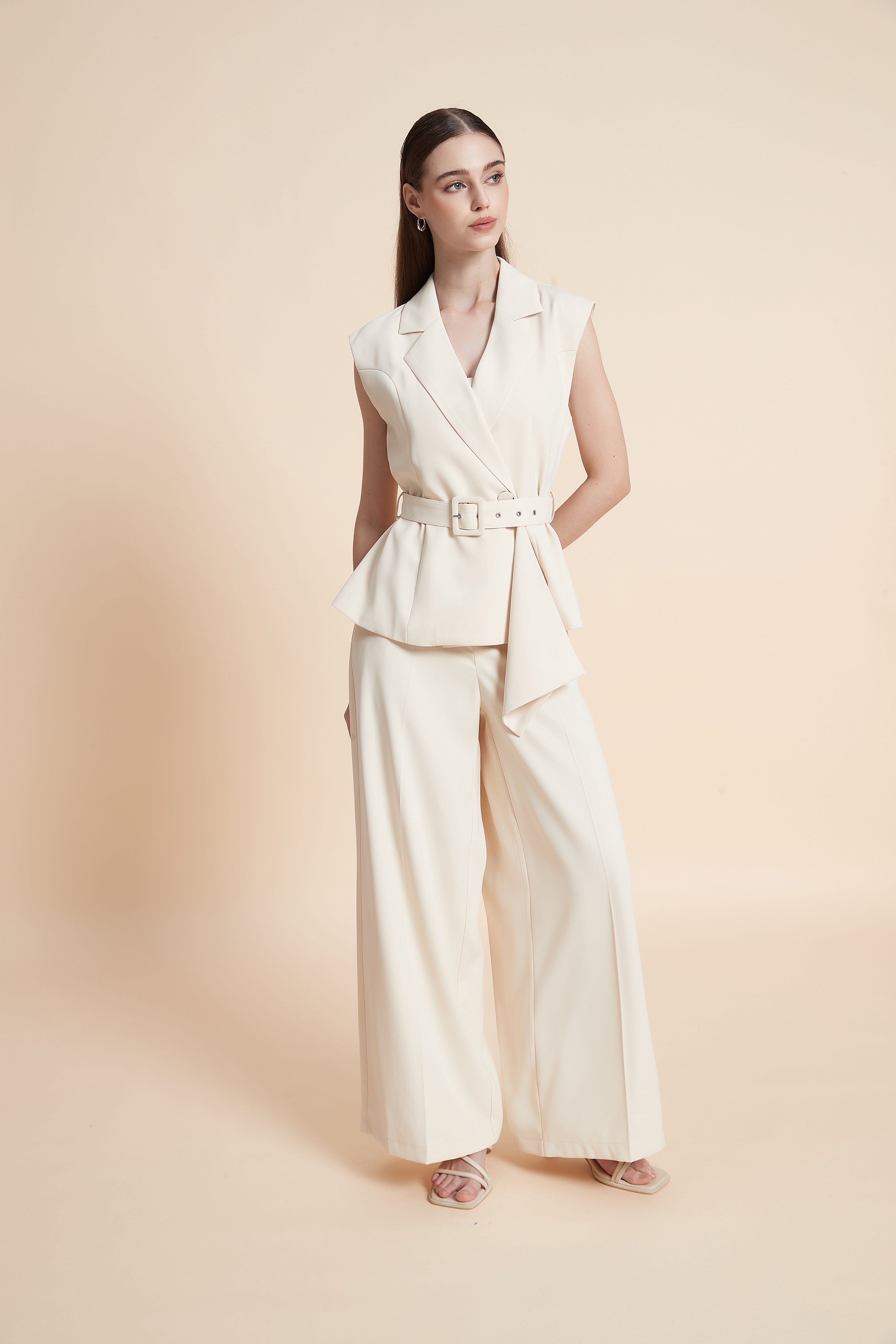 Tailored sleeveless vest with a belt