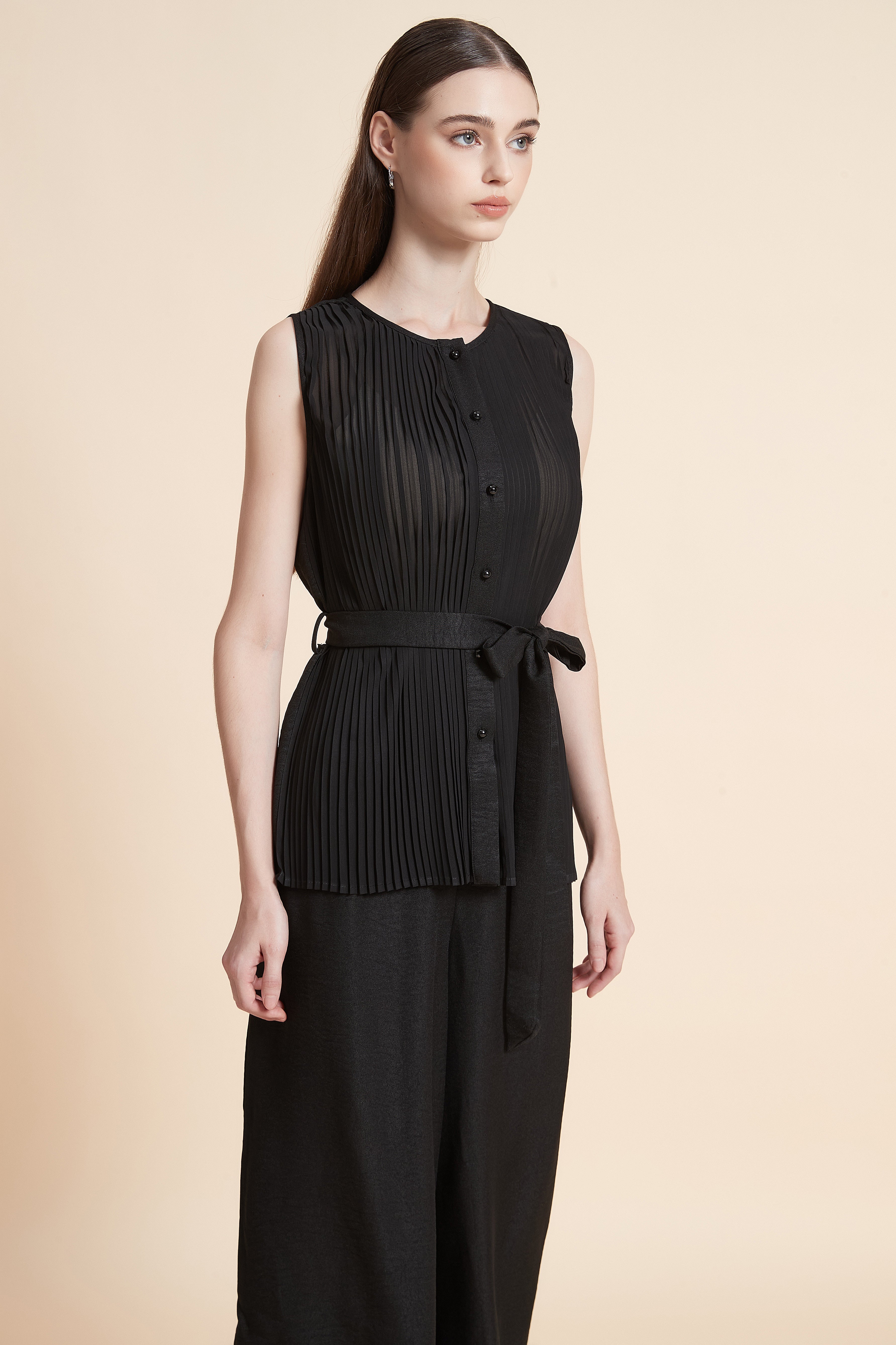 Sleeveless fine-striped top with a belt
