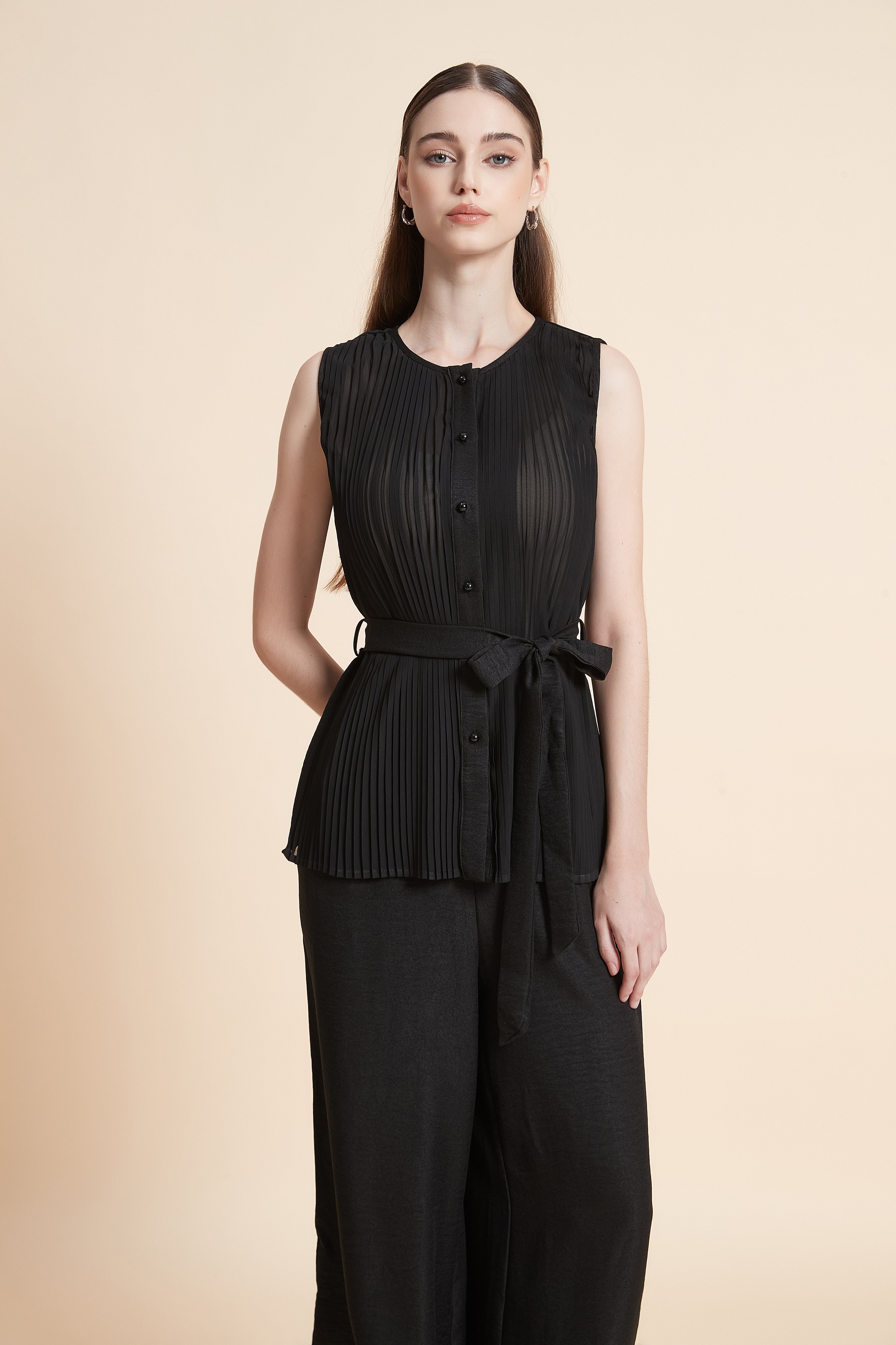 Sleeveless fine-striped top with a belt