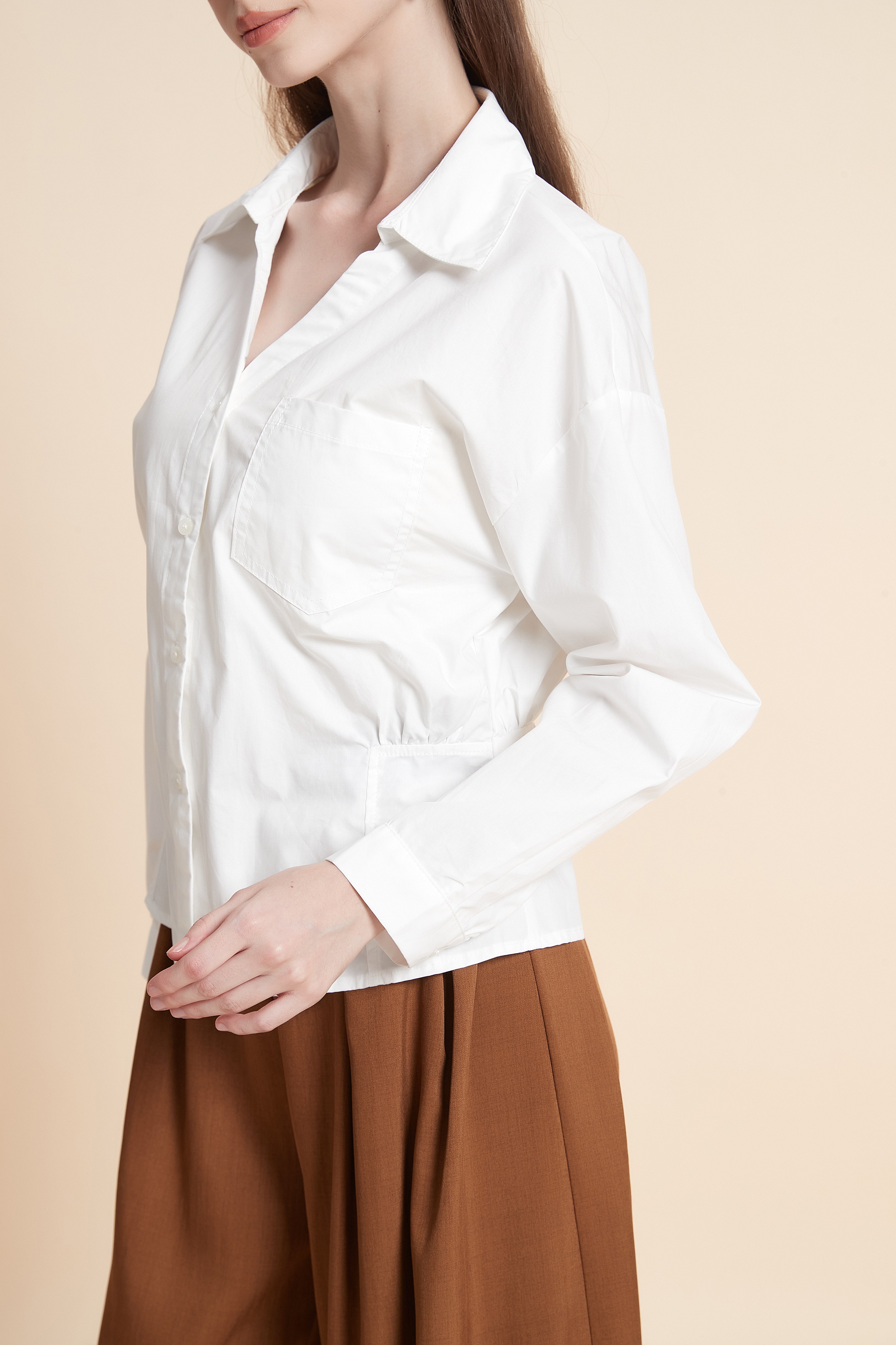 Button-up shirt with peplum hem