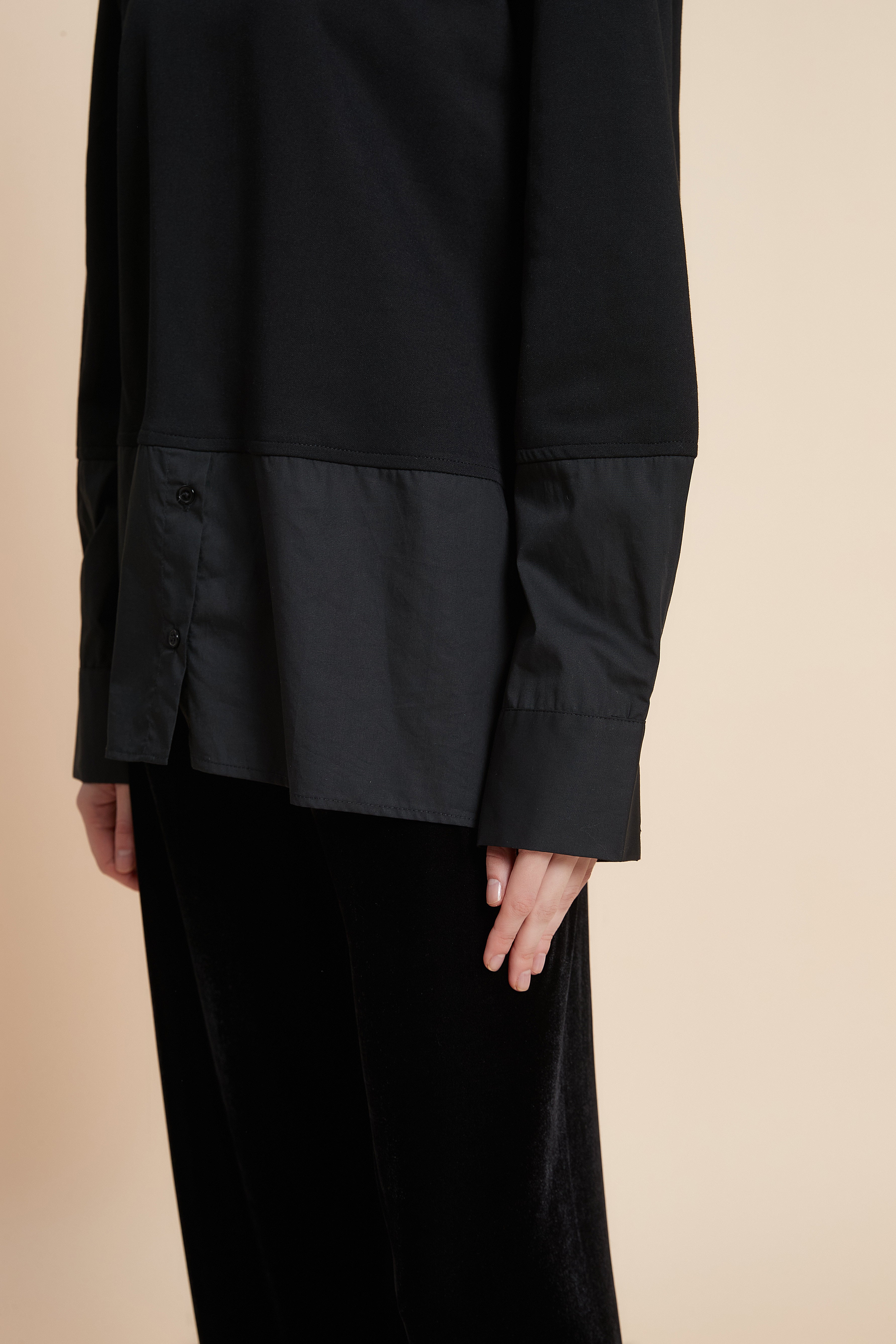 بلوزة بكم طويل بأزرار