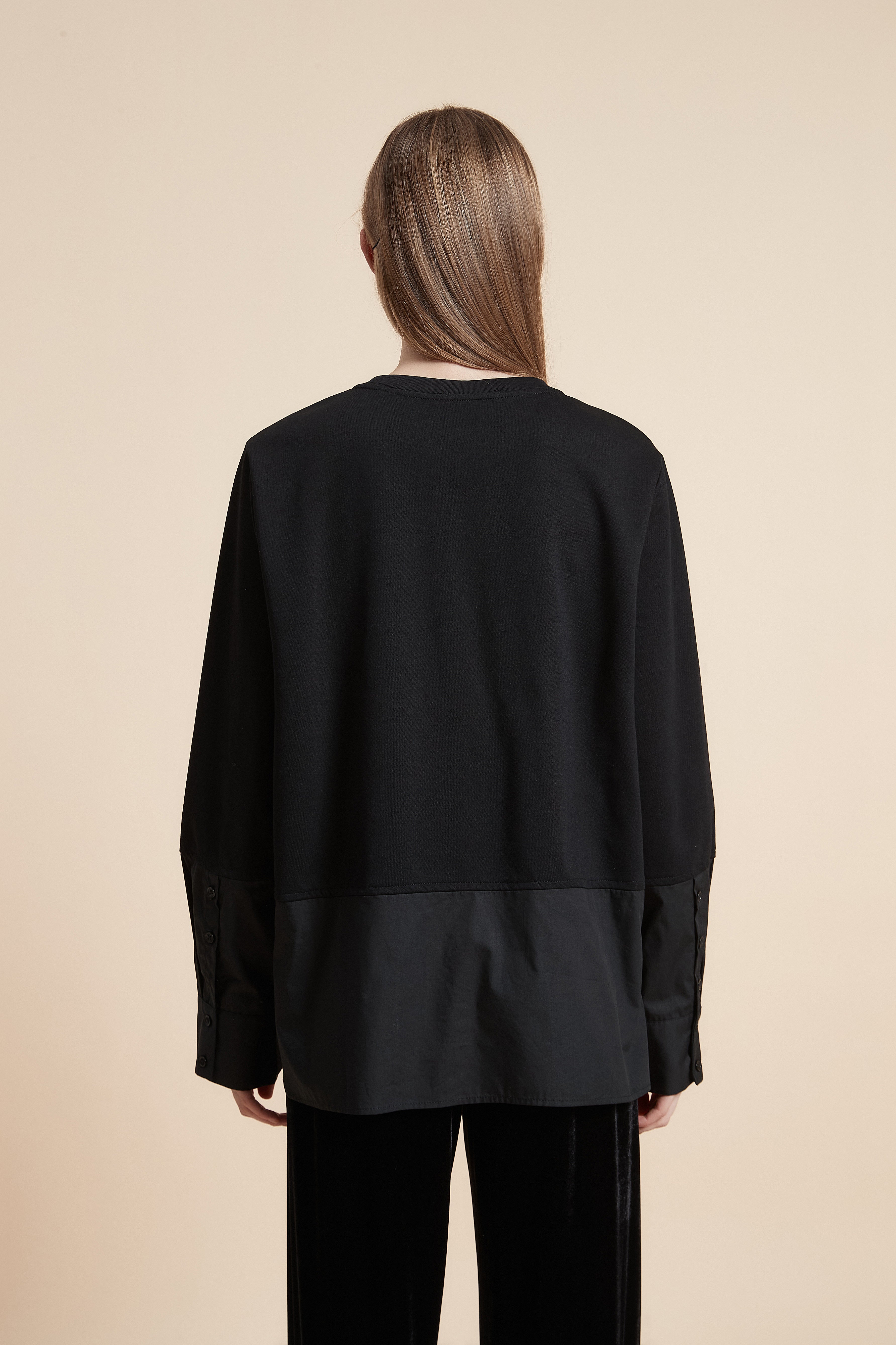 بلوزة بكم طويل بأزرار