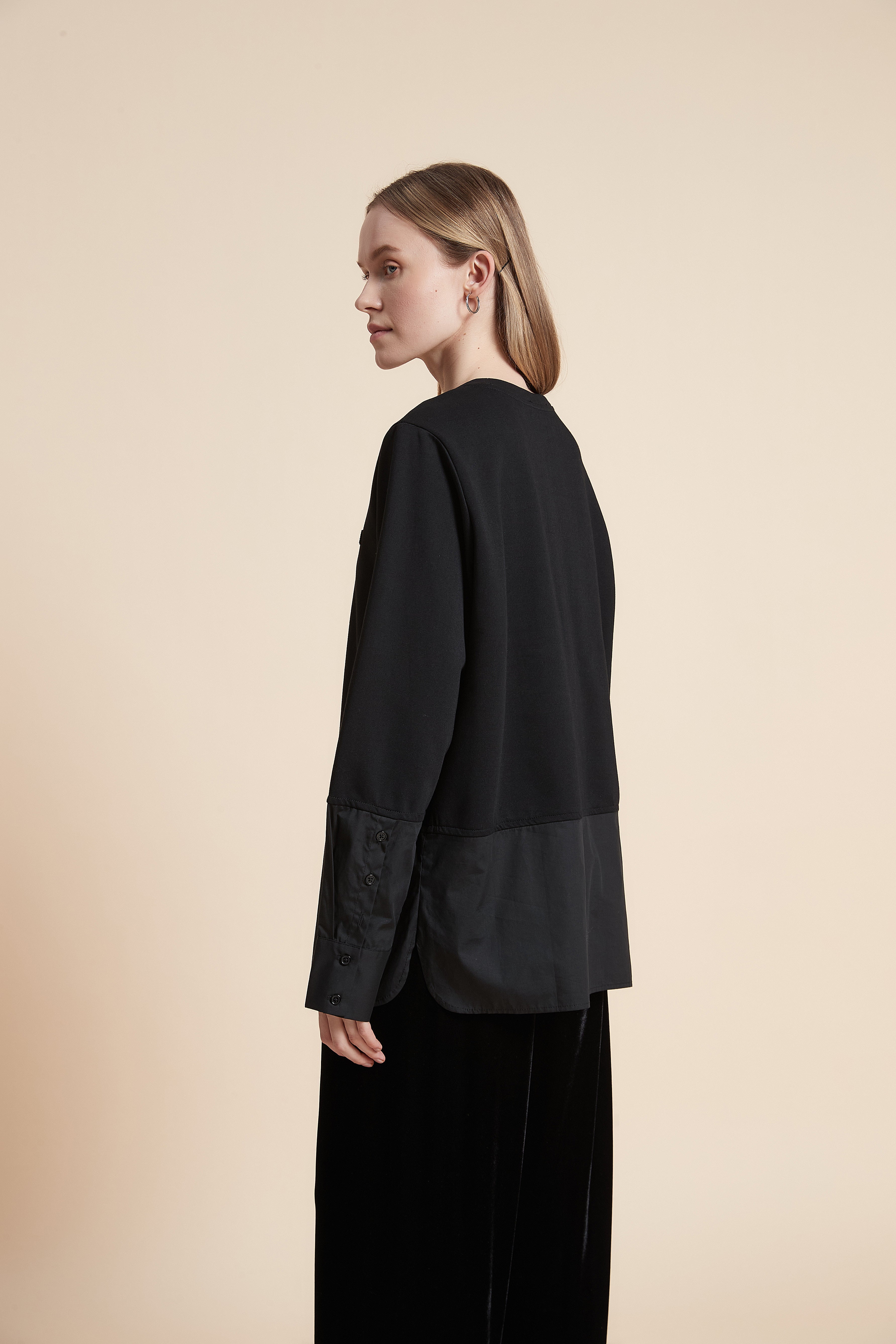 بلوزة بكم طويل بأزرار