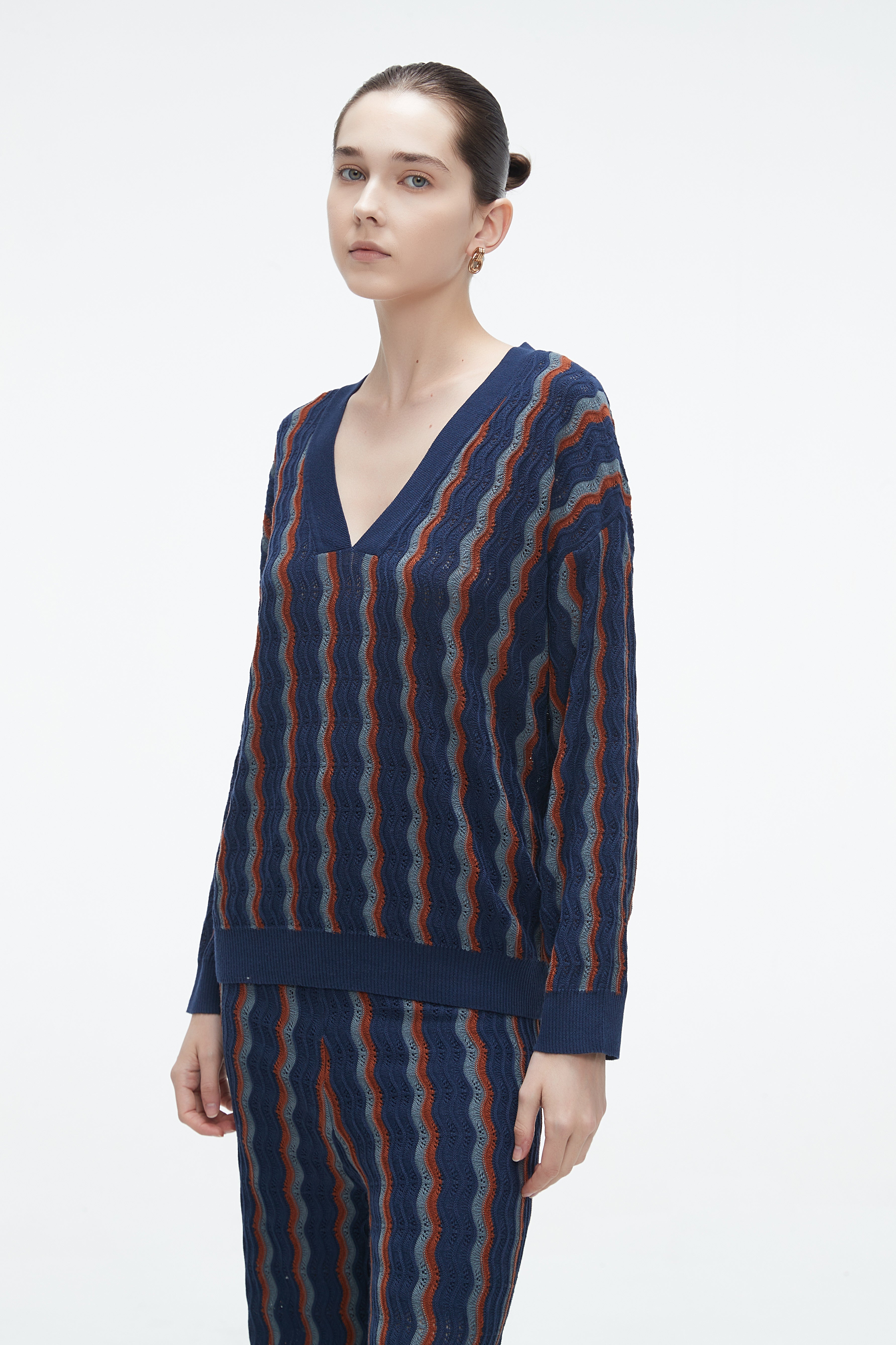 Yola winter blouse with a V-neck, vertically striped