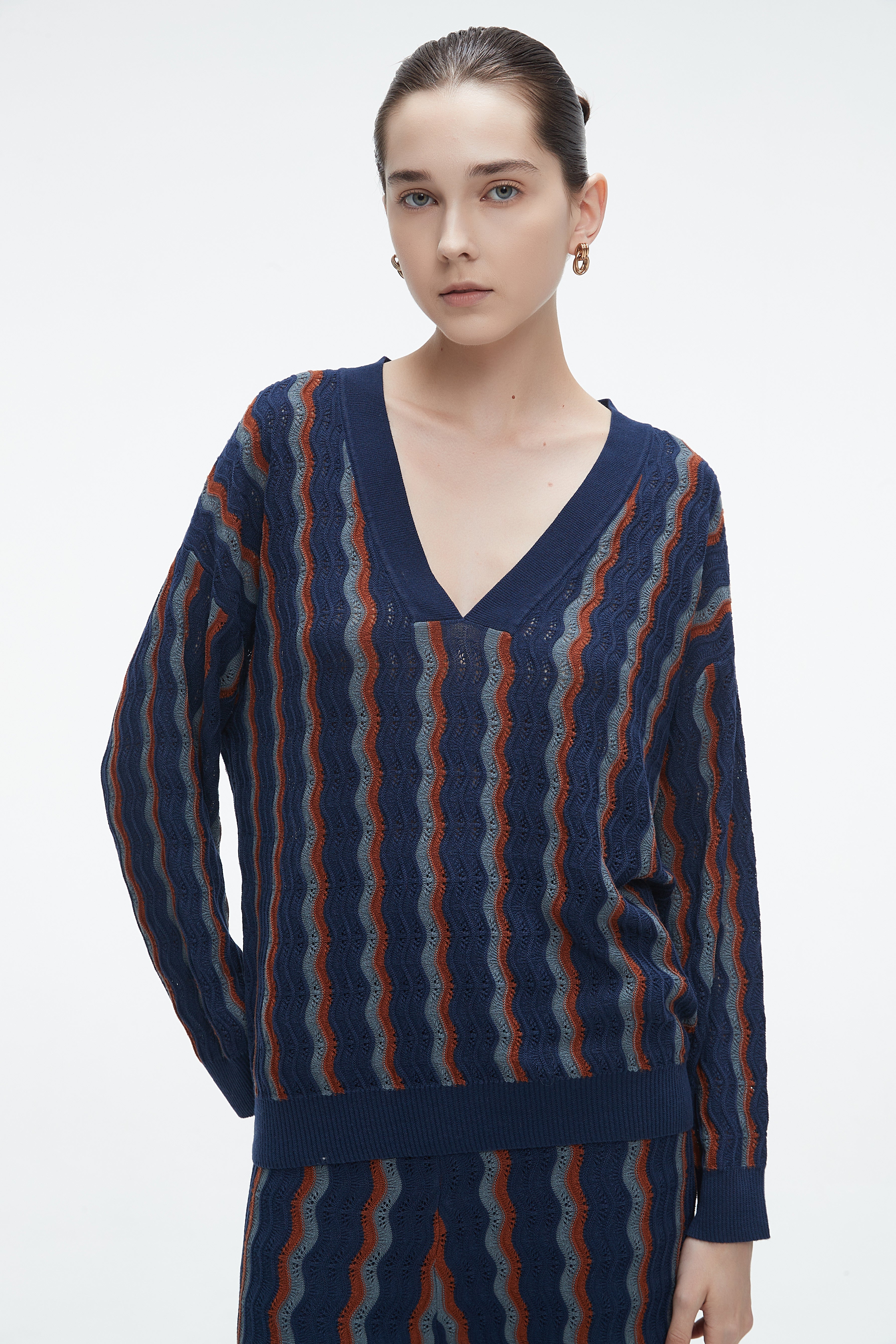 Yola winter blouse with a V-neck, vertically striped