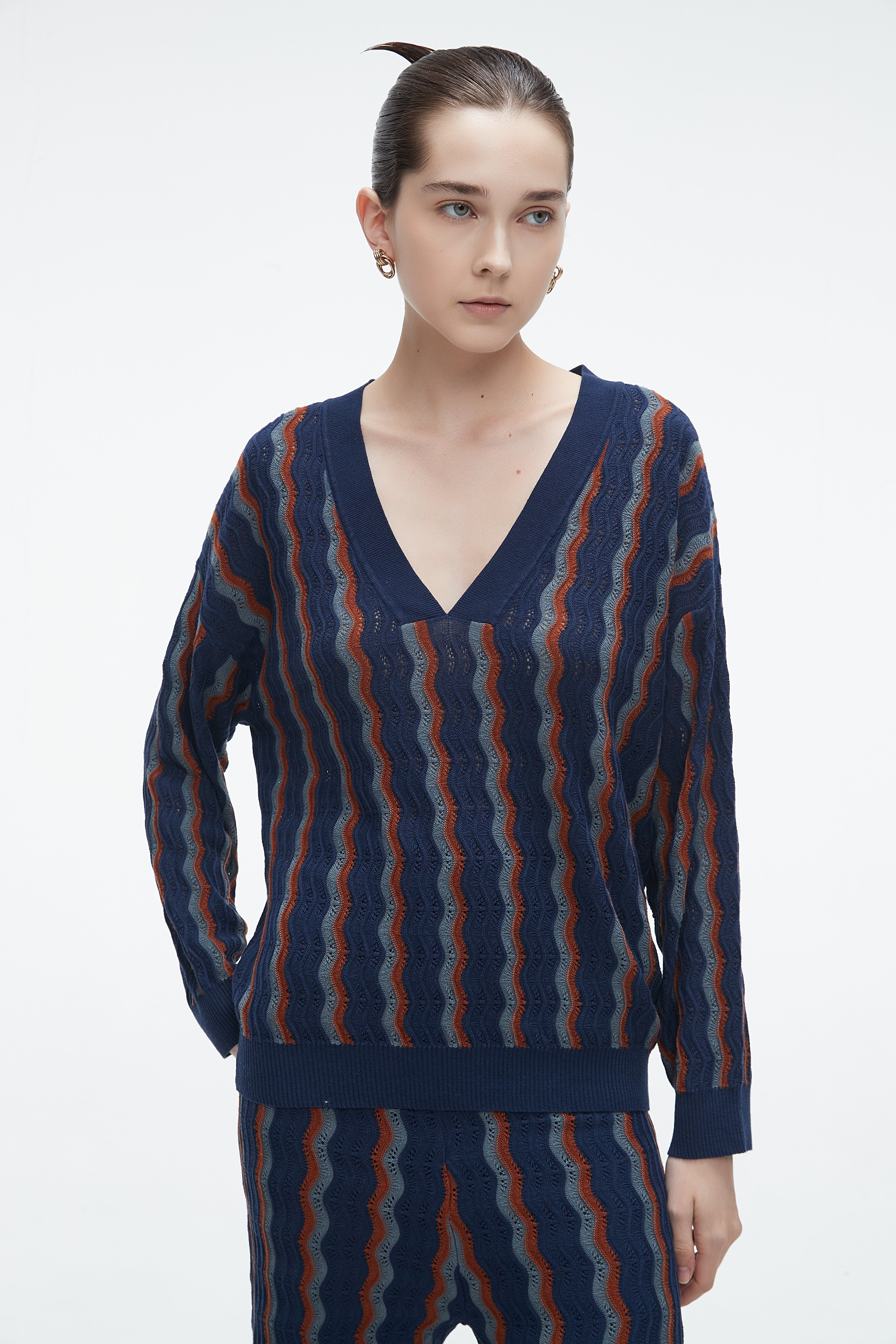 Yola winter blouse with a V-neck, vertically striped