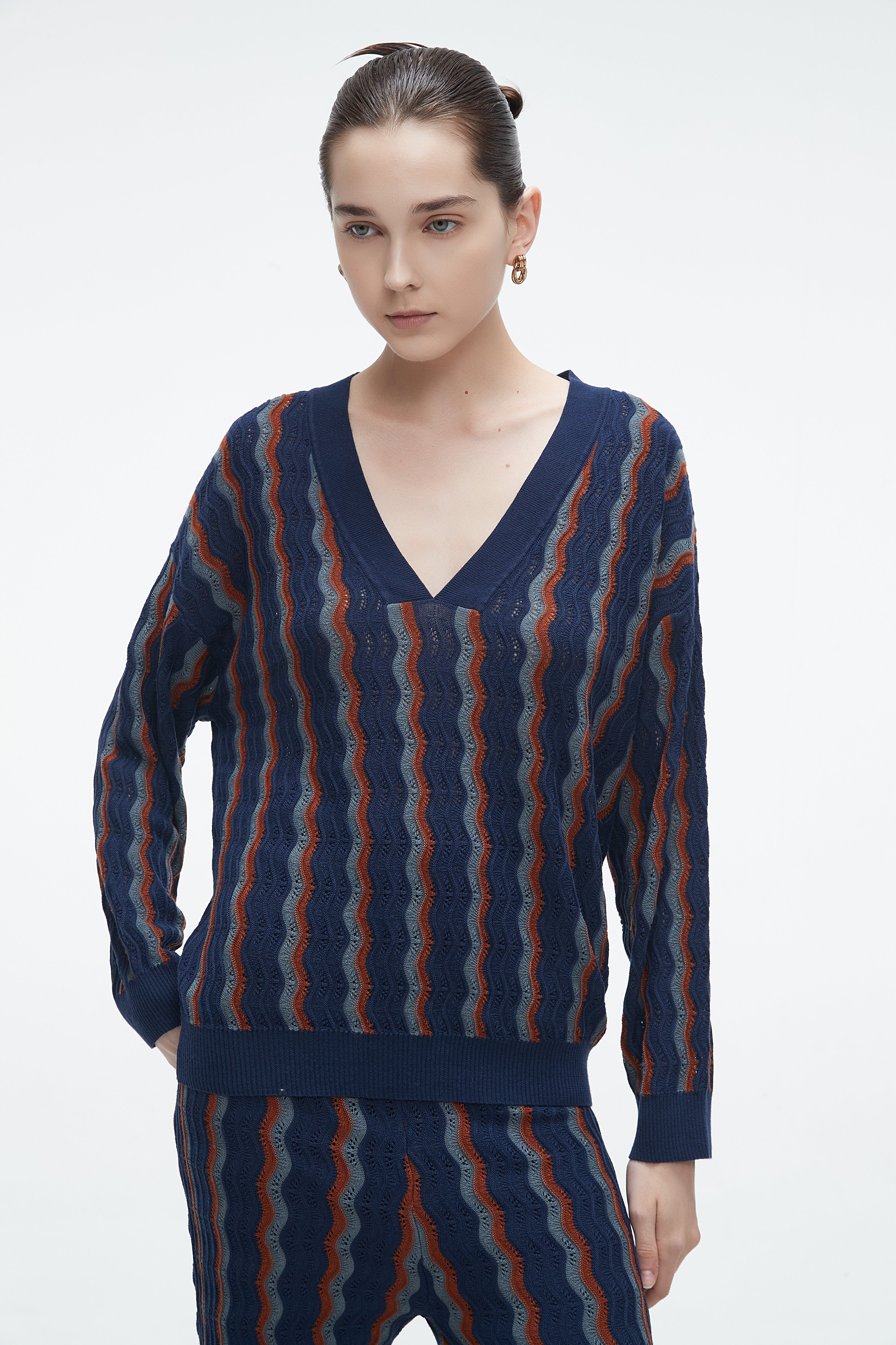 Yola winter blouse with a V-neck, vertically striped