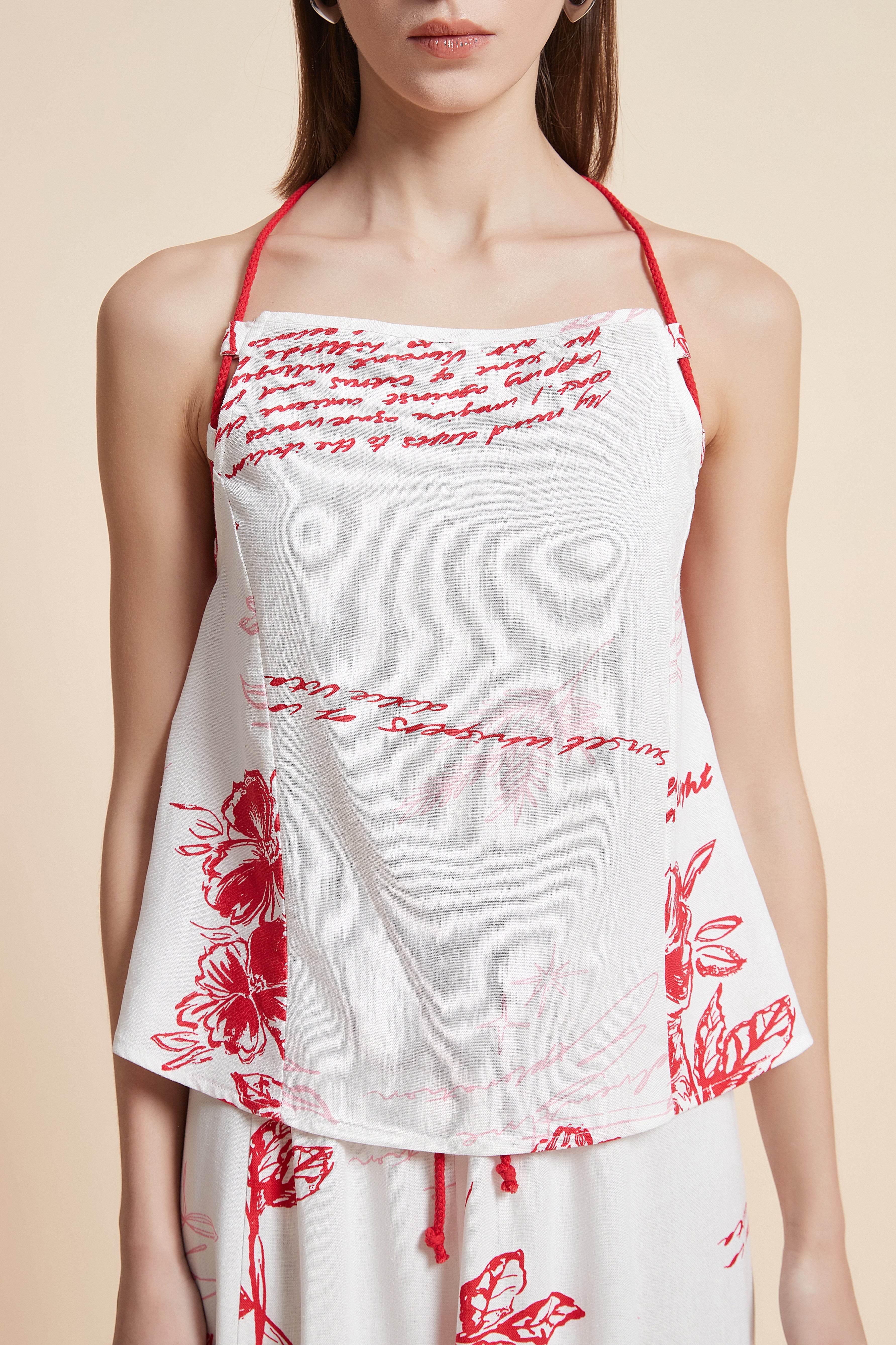 توب مزخرف بطول الخصر