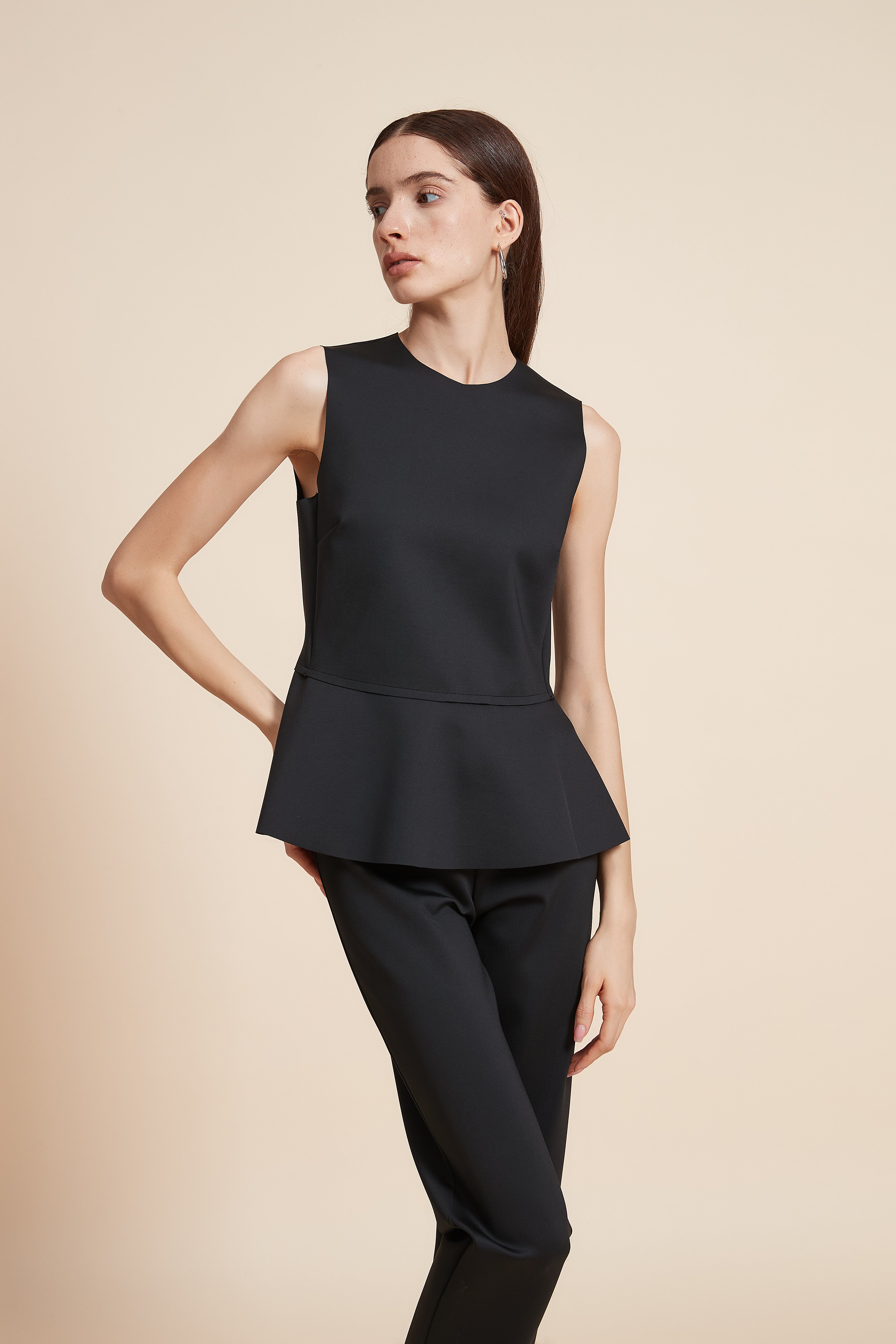 Plain Sleeveless Blouse With Ruffled Hem