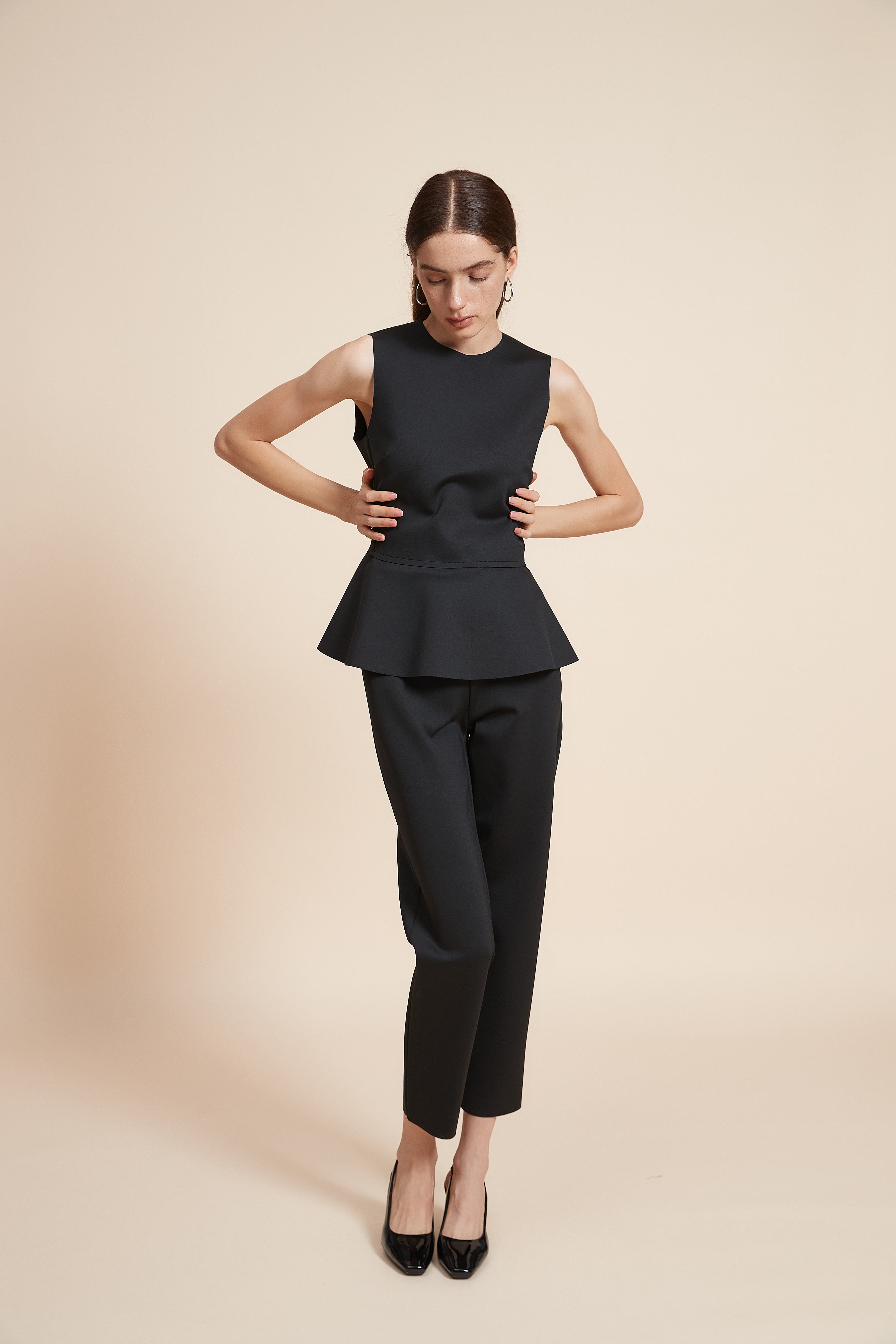 Plain Sleeveless Blouse With Ruffled Hem