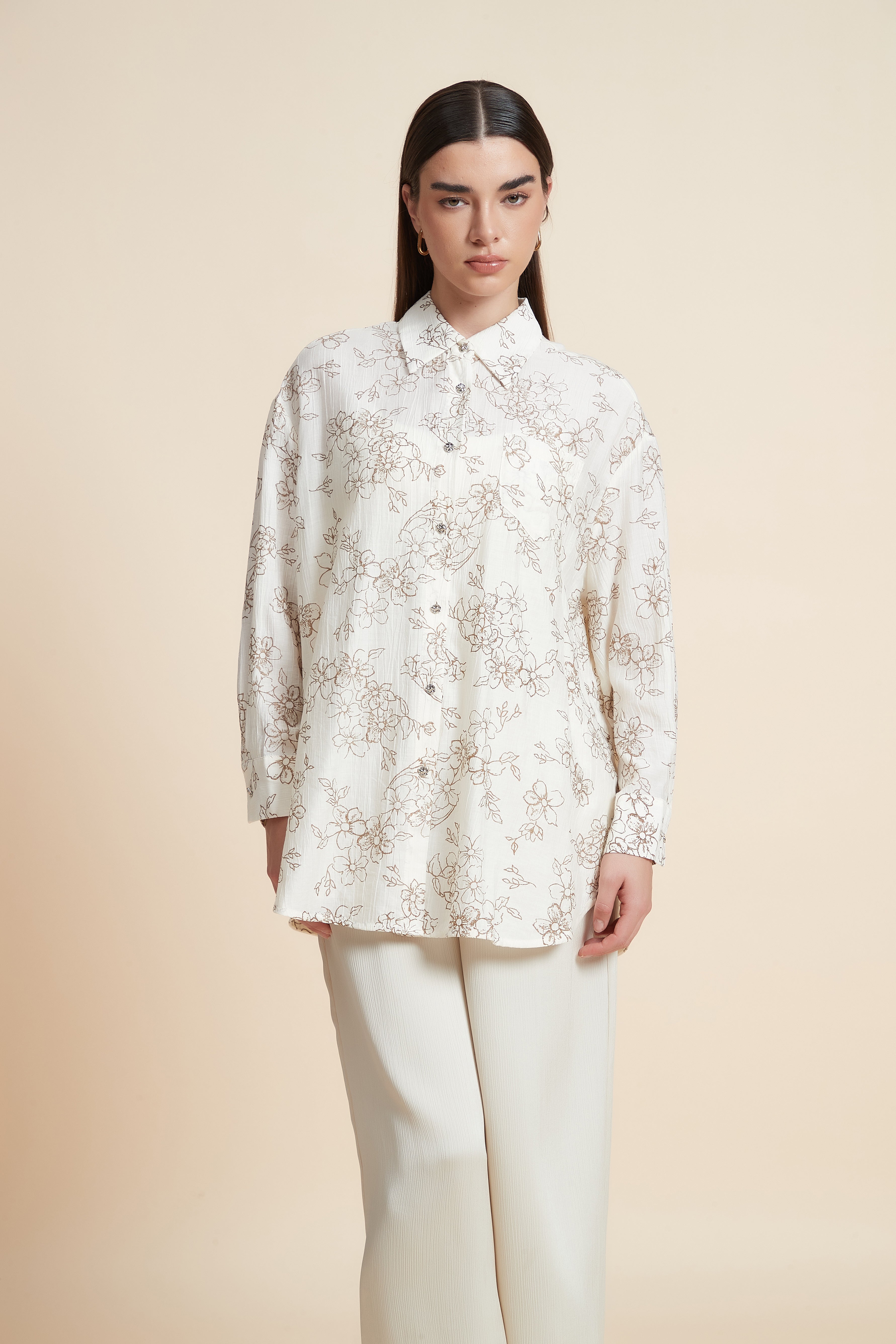 بلوزة منقوشة بكم طويل وياقة قميص