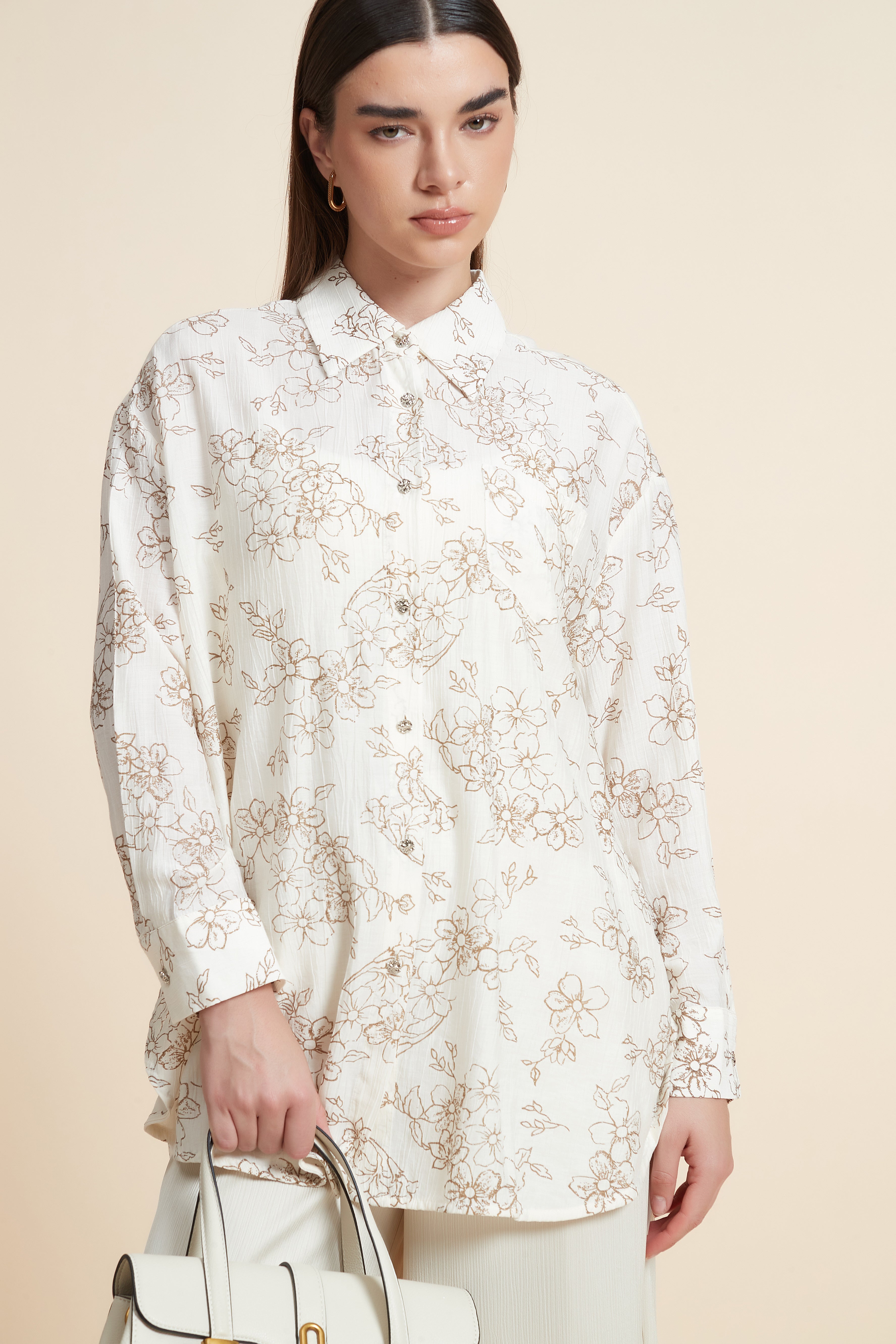 بلوزة منقوشة بكم طويل وياقة قميص