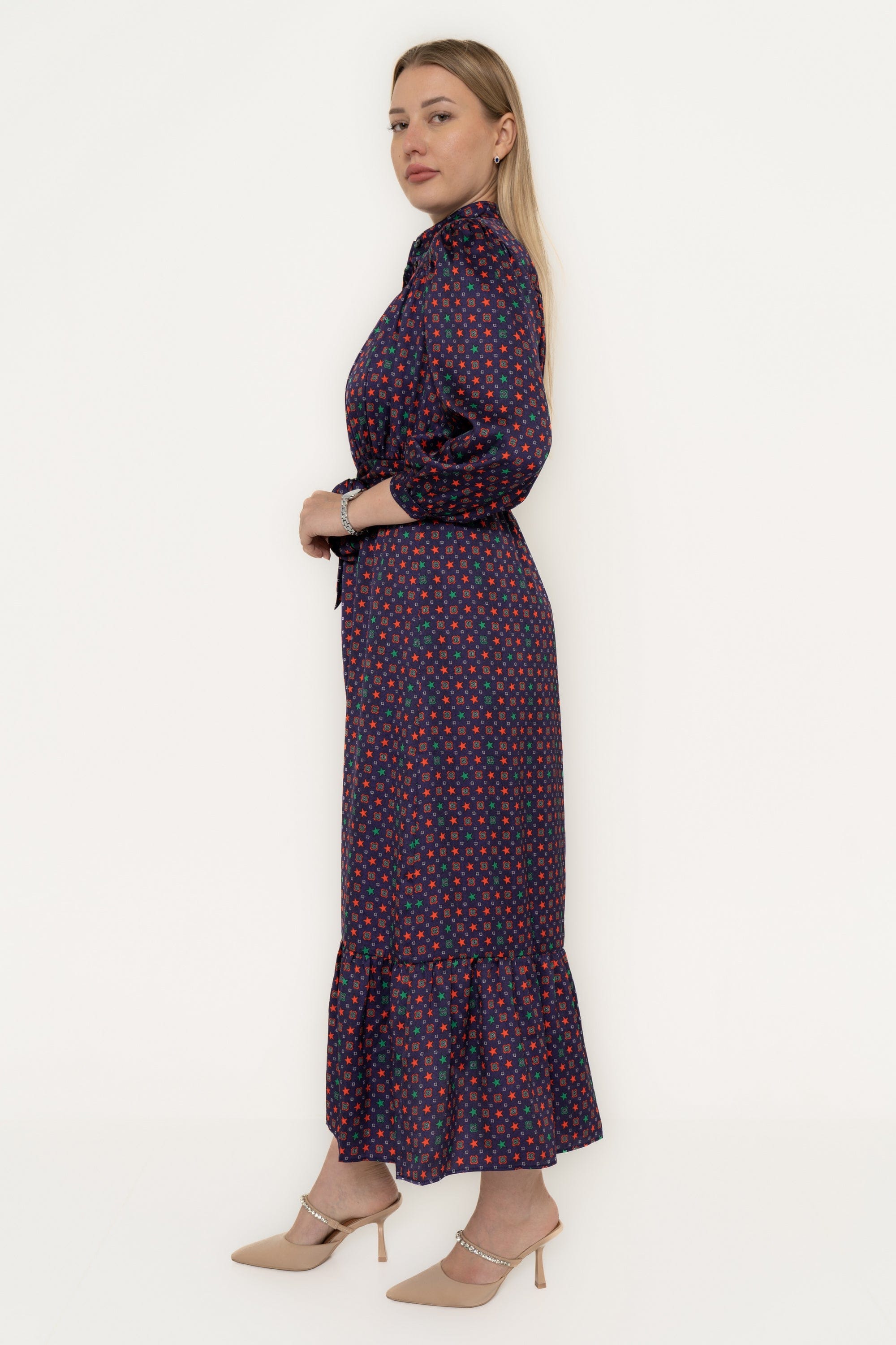 Yola Midi dress with long sleeves, waist tie, polka dots, and ruffled tail